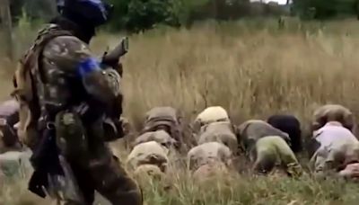 Watch moment Putin's troops surrender ‘en masse’ to Ukraine inside Russia