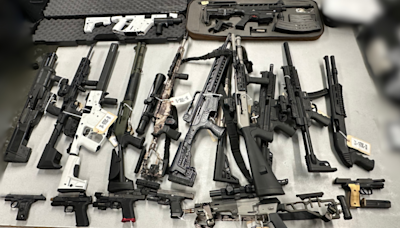 Police seize 20 guns, thousands of bullets, 4.5 kg of cocaine from Greater Victoria home