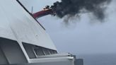 Carnival ship catches fire at sea, part of funnel collapses on deck