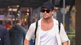 Chris Hemsworth cuts casual figure at Sydney Airport