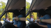 Malaysian police investigating after video surfaces allegedly showing British tourists 'paying' traffic fine on the spot