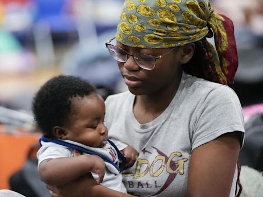 Rescuers race to free people trapped by Hurricane Helene after storm kills at least 21 in 4 states