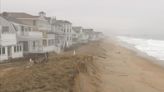 Climate change could be driving down some beachfront property prices in Massachusetts