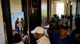 Panamanians vote in an election dominated by a former president who was barred from running