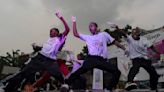 AP PHOTOS: In the spirit of perseverance, artists flock to Congo's biggest dance festival