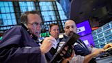 S&P 500, Nasdaq boosted by chip rally, Fed rate cut signals