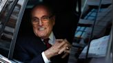 Man seen at Rudy Giuliani's 80th birthday party did not serve him with papers | Fact check