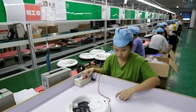 China's factory activity unexpectedly dips as property pain persists