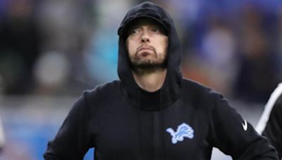 LOOK: Eminem takes 2024 NFL Draft stage in Detroit alongside Lions greats Barry Sanders, Calvin Johnson