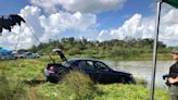 Law enforcement divers find car in Indiantown pond where 2 bodies found Monday