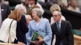 Theresa May and Romeo Beckham among spectators on drizzly day three of Wimbledon