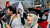 Small anti-war protest ruffles University of Michigan graduation ceremony