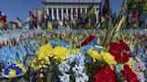 A precious moment in time of war: Flowers for a wife and daughter coming home to Ukraine