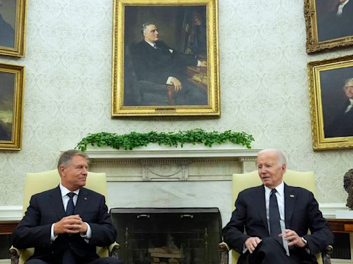 Biden hosts Romanian leader at the White House to celebrate NATO partnership