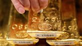 Gold prices dip in face of fewer rate cuts this year