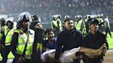 How a football match upset win led to violence and stampede in Indonesia
