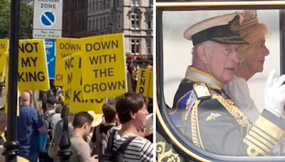 Mob of anti-monarchy protesters boo and shout 'not my King' as Charles goes past