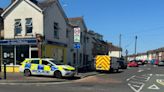 Cafe cordoned off by police as forensics examine inside