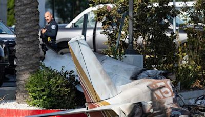 Small plane crashes in street, bursts into flames in Hawthorne