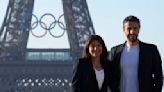 Paris Olympics organizers unveil a display of the five Olympic rings mounted on the Eiffel Tower