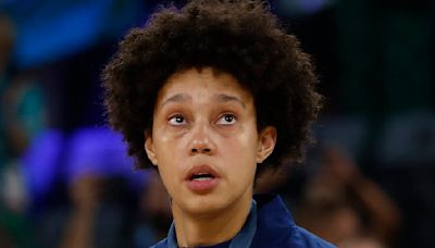 Griner begins to cry on podium after winning her third Olympic gold