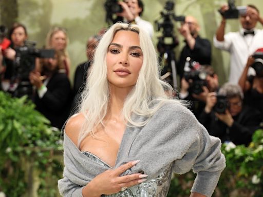 Kim Kardashian reveals why she wore grey cardigan to Met Gala after accessory confused fans