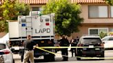 Family of man in 'happy hunting' shooting sues LAPD