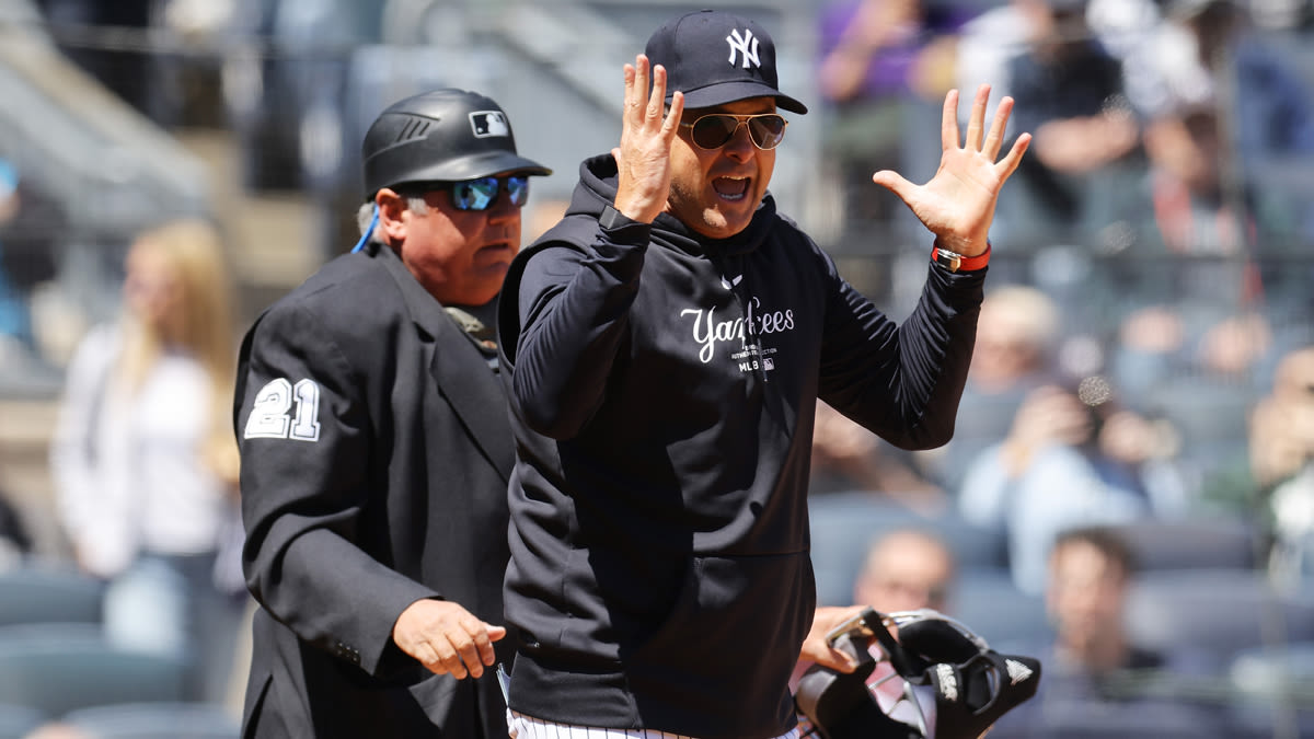 Hot mic catches Aaron Boone-umpire interaction after unusual ejection