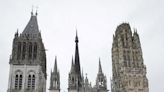 Fire in towering spire of medieval cathedral in French city of Rouen is under control