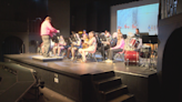 North Crawford High School Band performs song for seven-year-old based on her book of surviving cancer