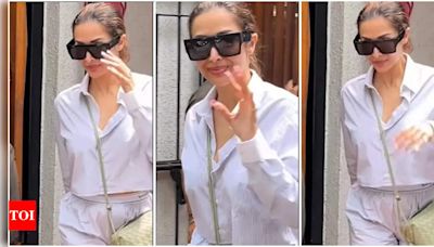 Malaika Arora turns heads in stylish white outfit during city appearance | Hindi Movie News - Times of India