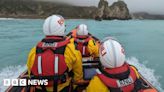 Lulworth Cove paddleboarders and dogs saved by lifeboat crew