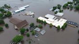 Midwestern flooding collapses a bridge, forces evacuations and kills at least 1