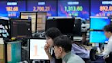 Stock market today: Asian shares mostly decline after Wall Street drifts to a mixed close