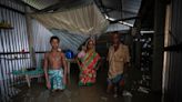 Resigned to a fate of constant displacement, India's river islanders return home in between floods