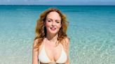 Heather Graham displays phenomenal physique in tiny string bikini in jaw-dropping new photos