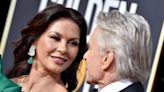 Catherine Zeta-Jones and husband Michael Douglas look so loved-up during star-studded outing