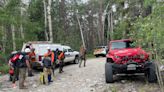 Hiker rescued after workmates left him on mountain, says search crew