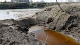 Commission asks attorney general to litigate massive fertilizer spill