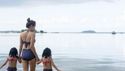 Wear the bathing suit and let your kids see you happy and confident in it