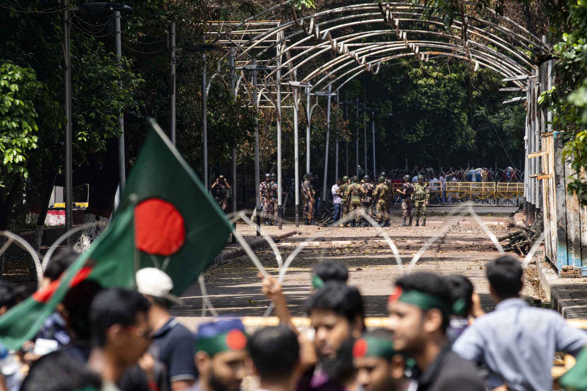 Bangladeshi protesters attack supporters of ex-premier Hasina and harass journalists