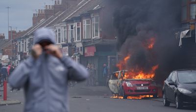 Police steeled for further violence as more than 140 charged over riots