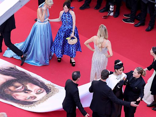 The same Cannes security guard went viral for shooing 4 celebs. What's going on?