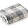 Soft and breathable blanket made from 100% cotton. Suitable for all seasons and provides comfortable insulation without trapping heat. Often used as a lightweight layer on top of a sheet.