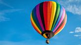 2 passengers, pilot burned after hot air balloon struck power lines