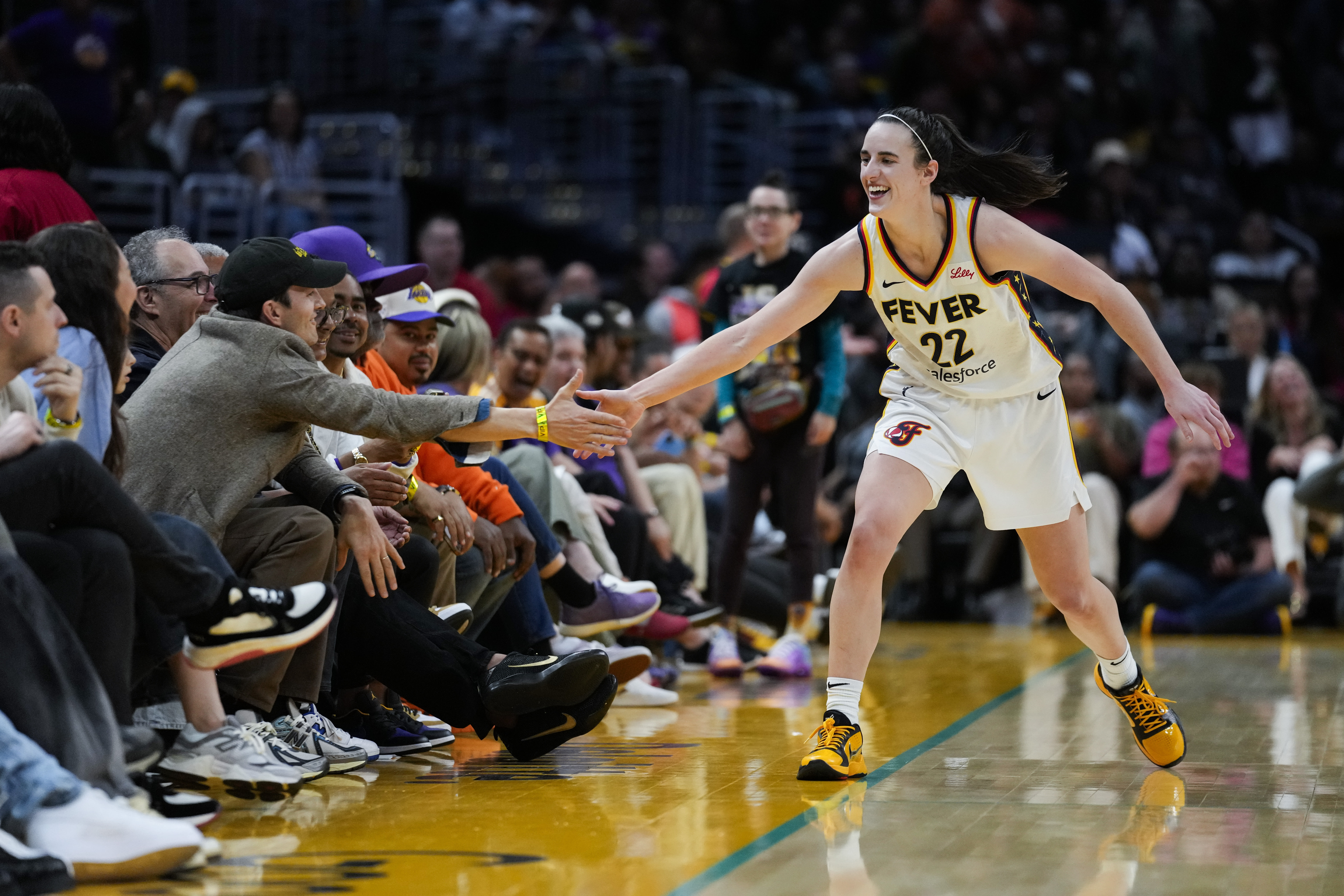 Caitlin Clark and Indiana Fever win 1st game of season, beat LA Sparks 78-73 in front of 19,103