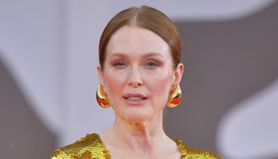 Julianne Moore shines in golden plunging gown at The Room Next Door premiere