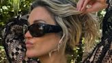 Ashley Roberts flaunts her sensational figure in a skimpy black bikini