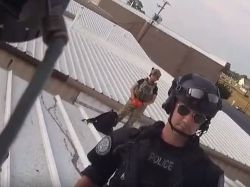 Bodycam footage shows moments after man who tried to assassinate Donald Trump was shot dead