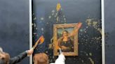 Mona Lisa splattered in soup at Louvre Museum in Paris by food protesters